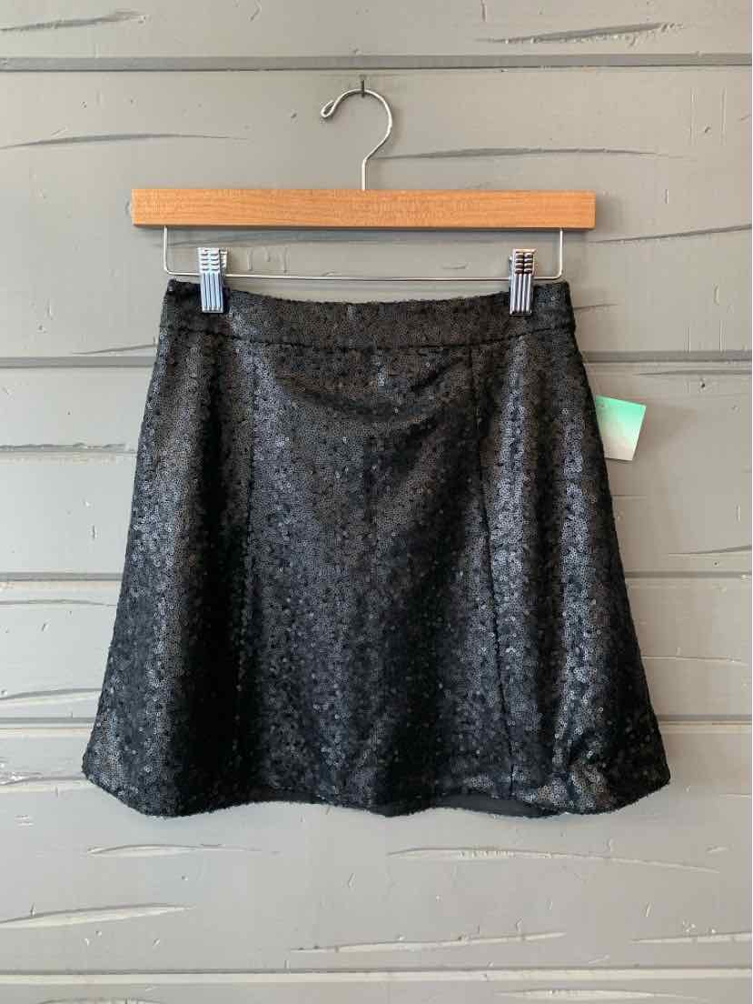 Black sequin mini skirt with A-line silhouette and fitted waistband, size XS.