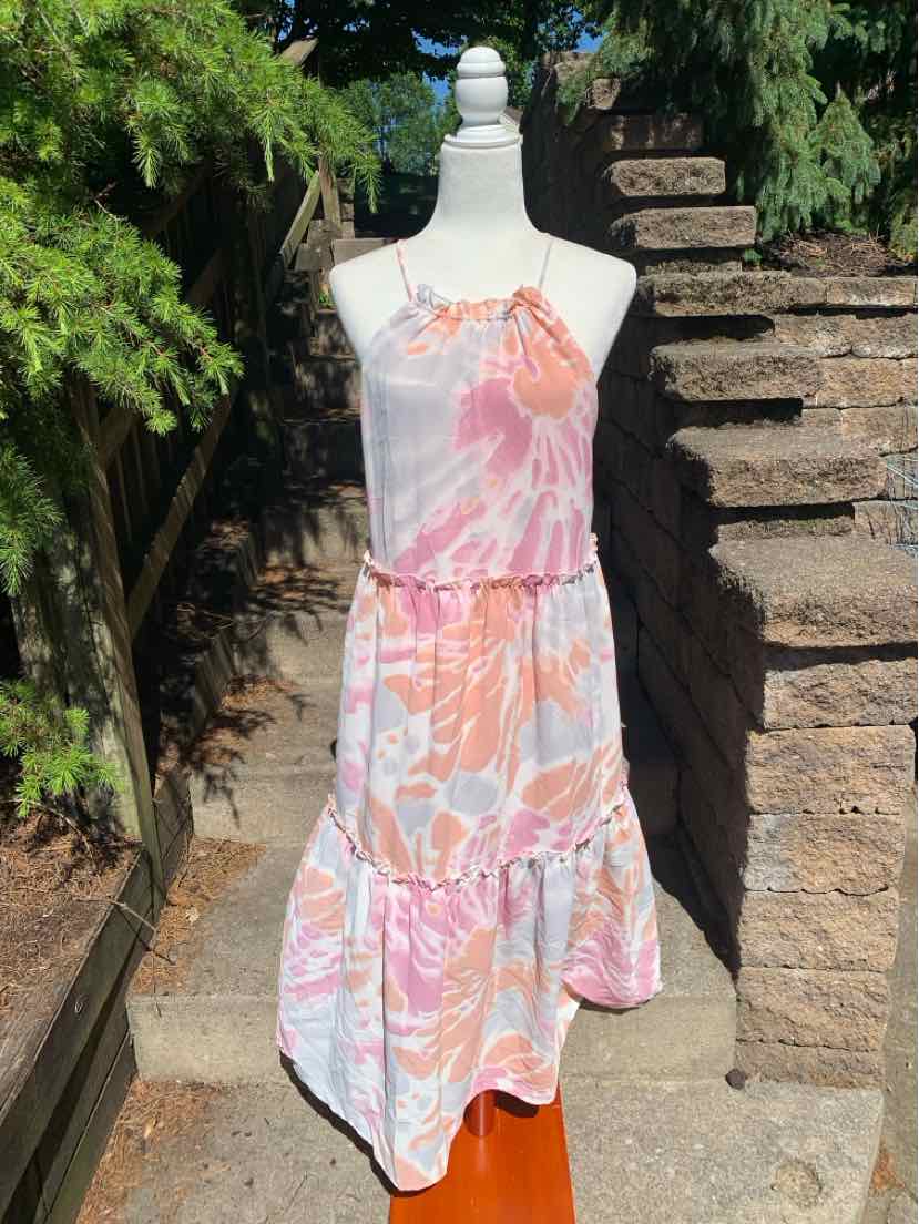 Sleeveless midi dress with pink and orange floral tie-dye pattern, ruffled hem, and adjustable spaghetti straps.