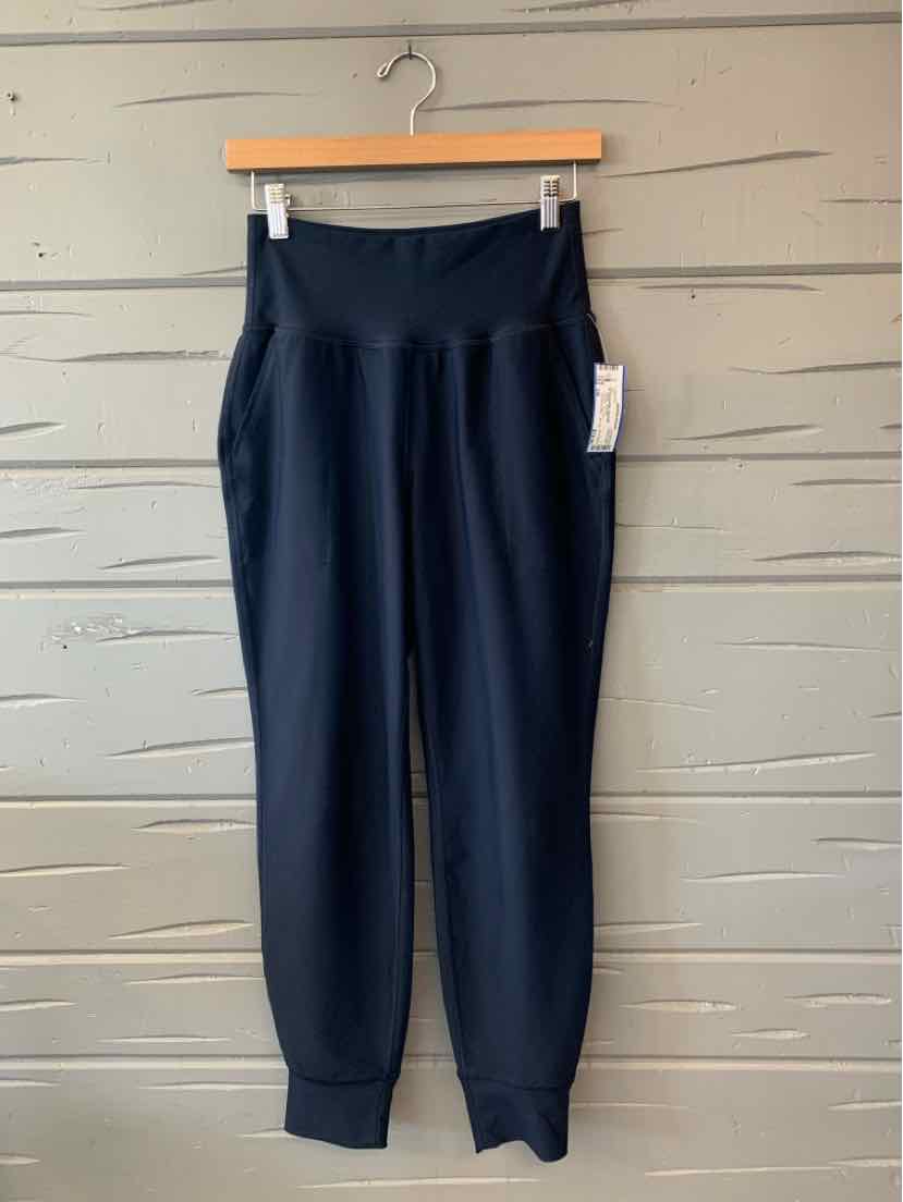 Navy blue Old Navy women’s jogger pants with an elastic waistband and ribbed ankle cuffs.