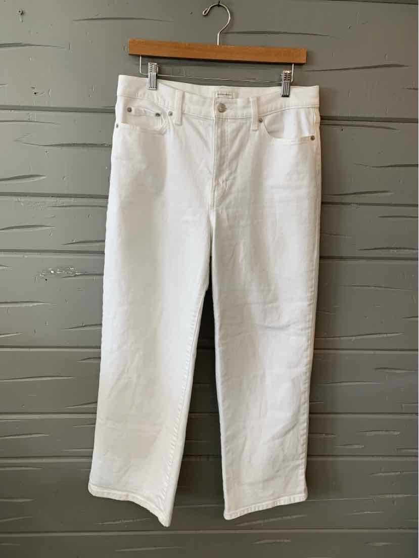 White denim jeans with straight-leg fit, five-pocket style, and belt loops, size 10.
