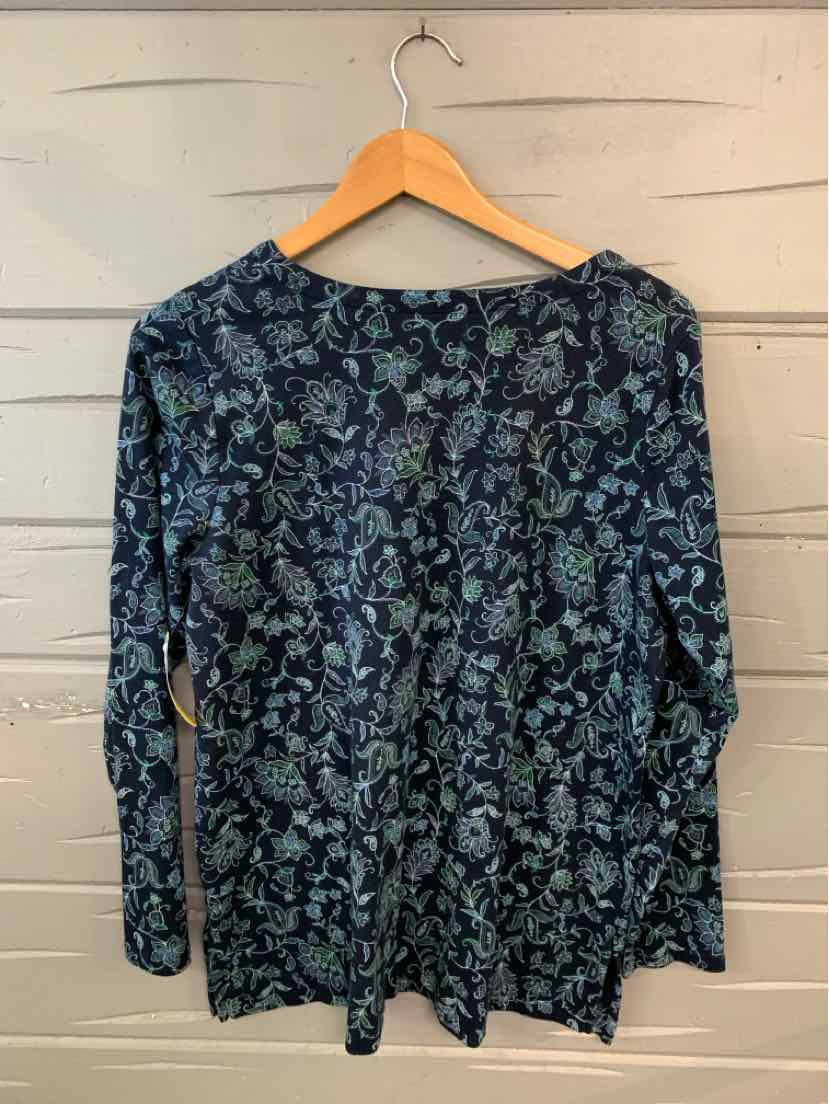 Long-sleeve navy blue blouse with floral print in shades of blue and green, lightweight fabric.