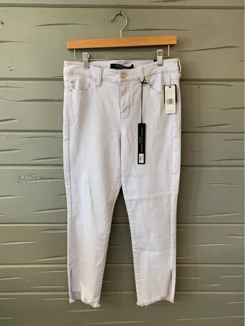 Light lavender high-waist denim jeans with frayed hems and front pockets, size 6.
