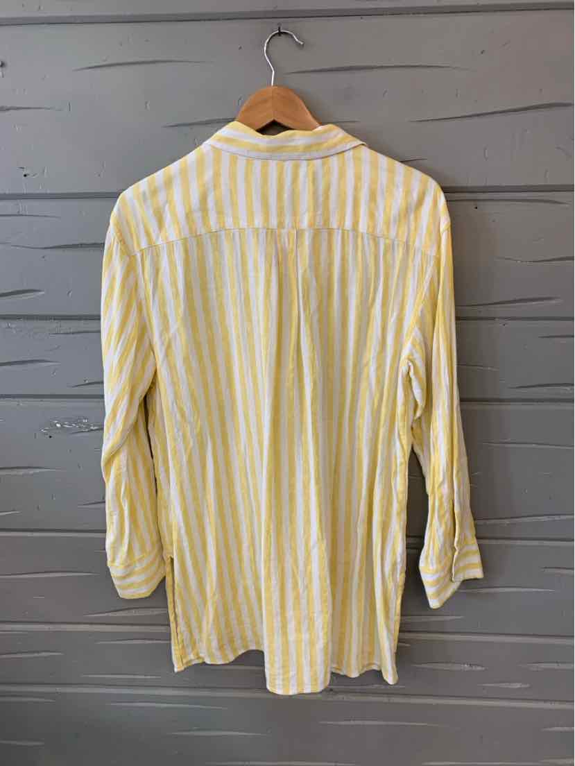 Yellow and white vertical striped long-sleeve button-up shirt in medium size hanging on wooden hanger.