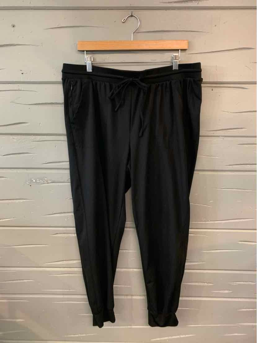 Black drawstring waist jogger pants with tapered legs and elastic cuffs in size XL.