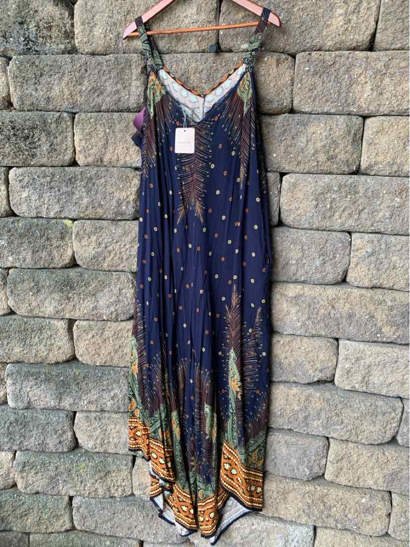 Navy blue sleeveless maxi dress with adjustable straps, floral pattern, and orange border trim at hem.