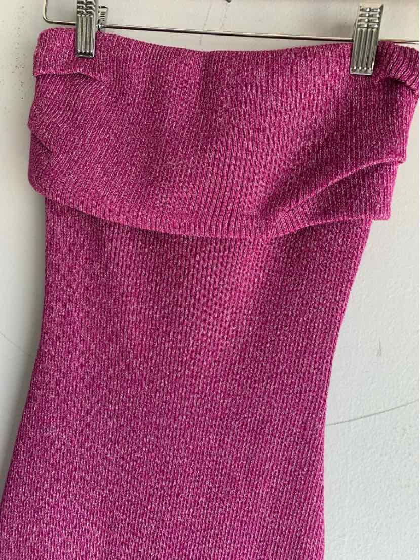 Pink ribbed knit tube top with folded over neckline in size XS hanging on clips.