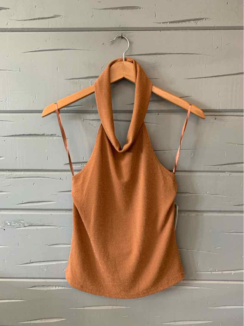 Tan sleeveless halter top with twisted neckline and fitted silhouette on wooden hanger.