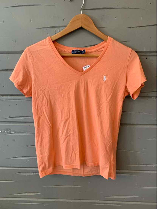 Women's orange V-neck polo shirt with short sleeves and small embroidered logo on chest.
