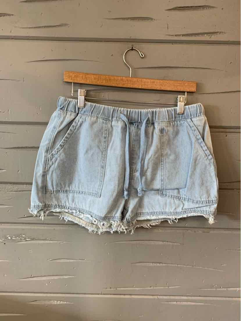 Light blue denim shorts with elastic waistband, drawstring, front pockets, and frayed hems.