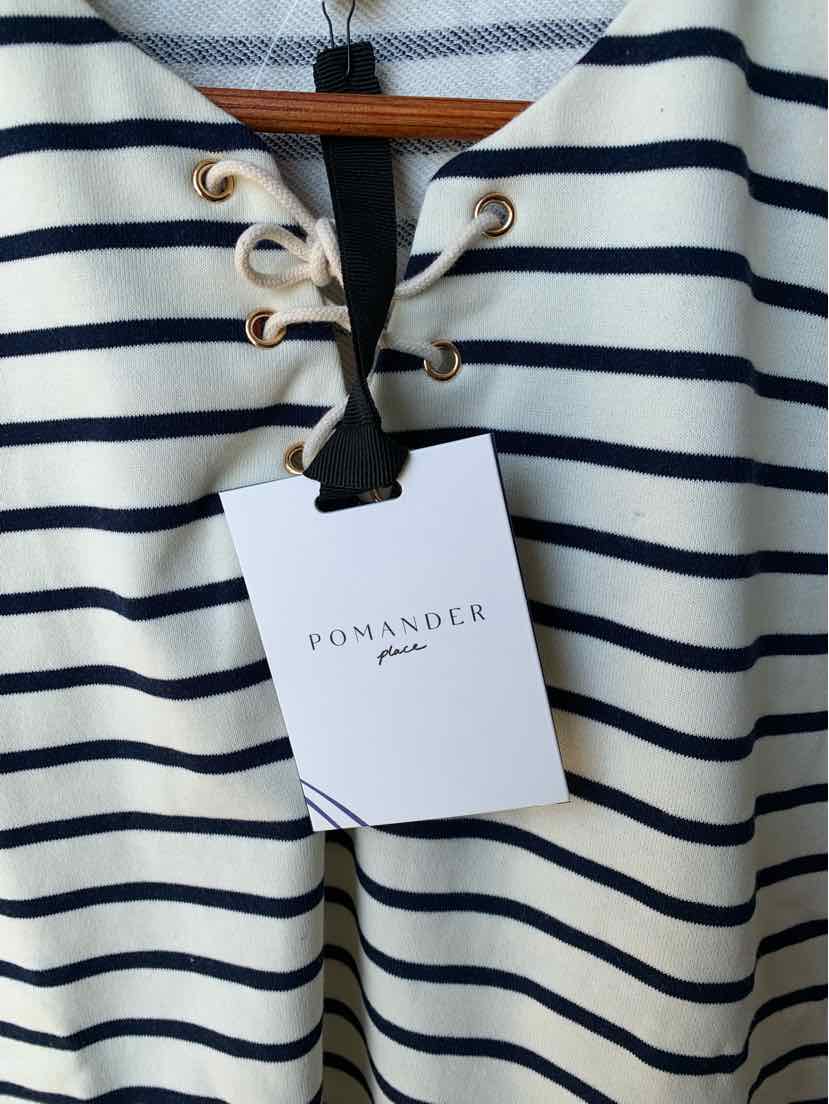 Cream and navy striped shirt with lace-up neckline and Pomander Place tag.