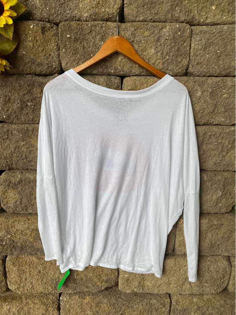 White long-sleeve lightweight knit top with wide round neckline, size small, hanging on wooden hanger.