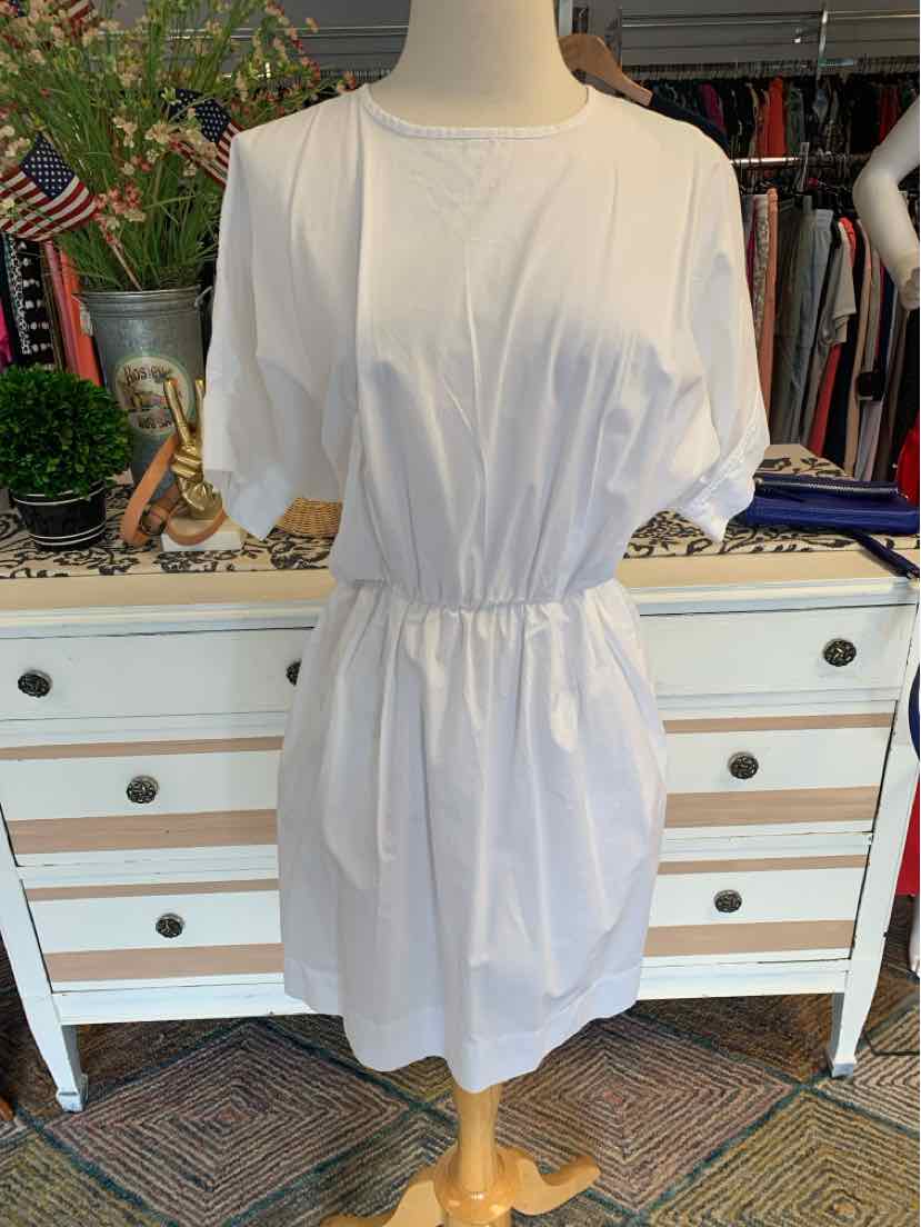 White short-sleeve dress with elastic waist and round neckline on mannequin.