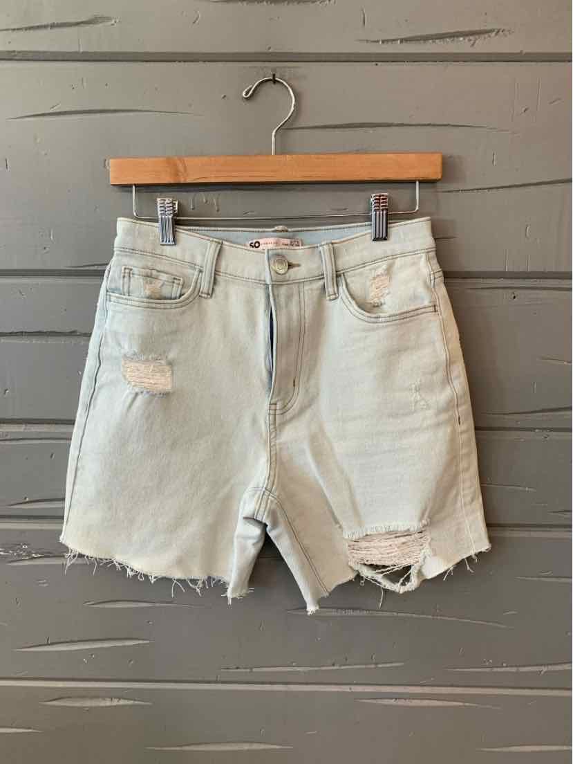 Light wash denim shorts with distressed details and frayed hem, size 5.