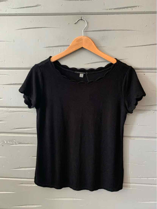 Black short-sleeve women's top with scalloped edges, crew neckline, and soft fabric, size medium.