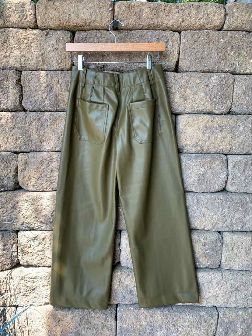 Olive green faux leather wide-leg pants with high waist and back patch pockets.