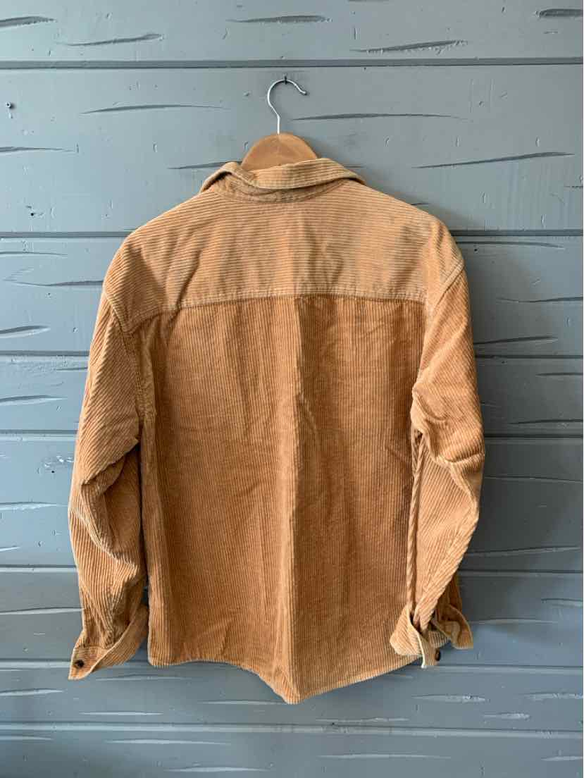 Tan corduroy long-sleeve shirt with a yoke back detail, size large, hanging on a hook.