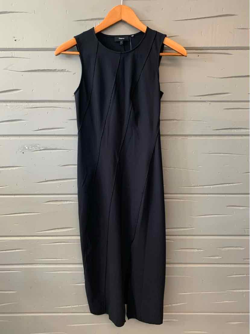 Sleeveless black midi dress with round neckline and subtle seam detailing.