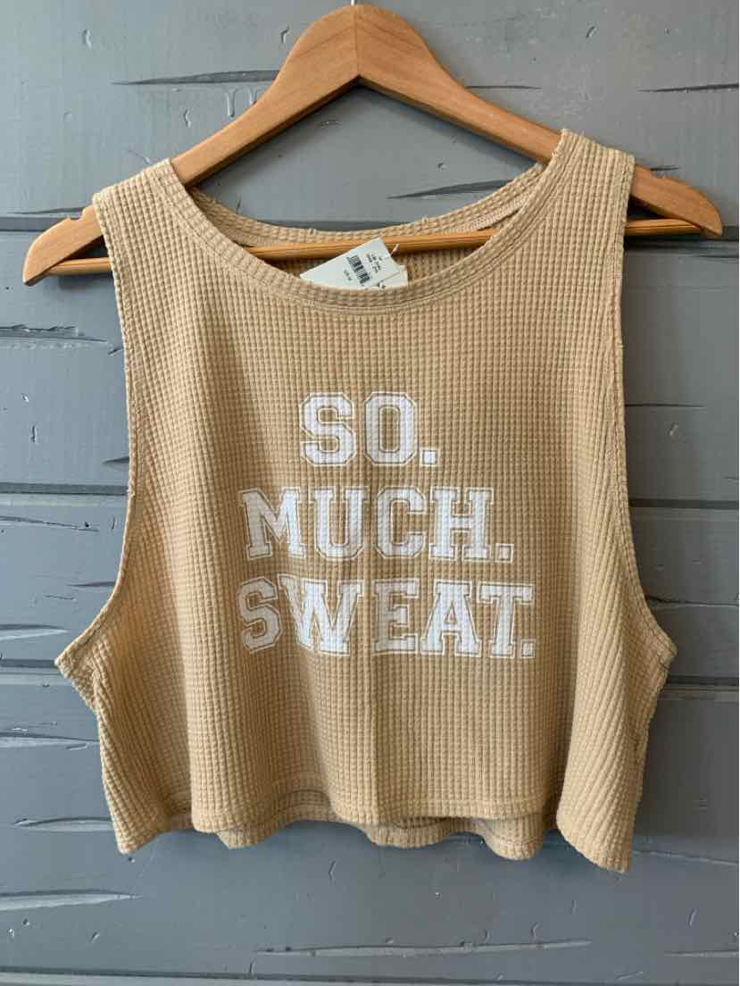 Tan ribbed sleeveless crop tank with white "SO. MUCH. SWEAT." text on front.