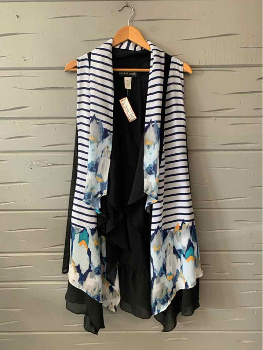 Sleeveless open-front vest with black and white stripes, floral side panels, and asymmetrical black hem in size 1X.