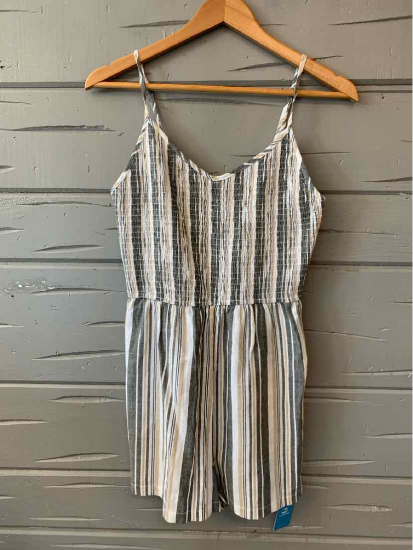 Gray and white striped sleeveless romper with adjustable spaghetti straps and gathered waist.