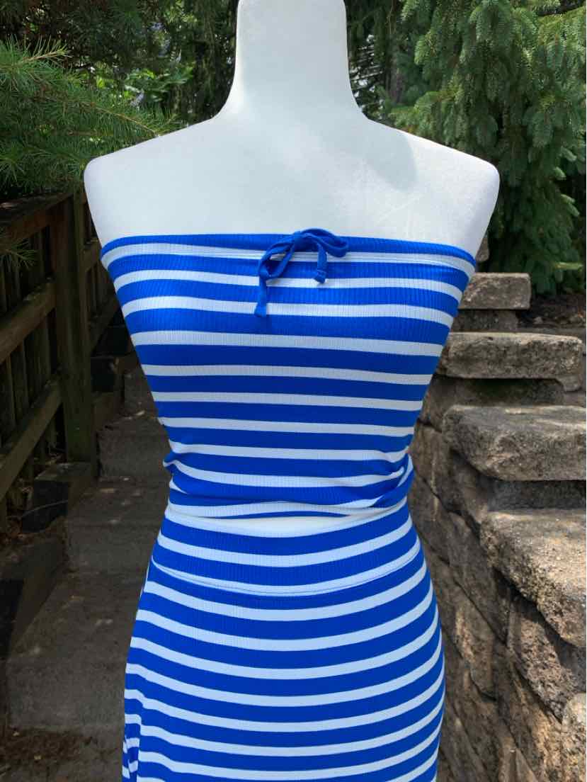 Blue and white horizontal striped strapless dress with a small front tie detail, fitted silhouette.