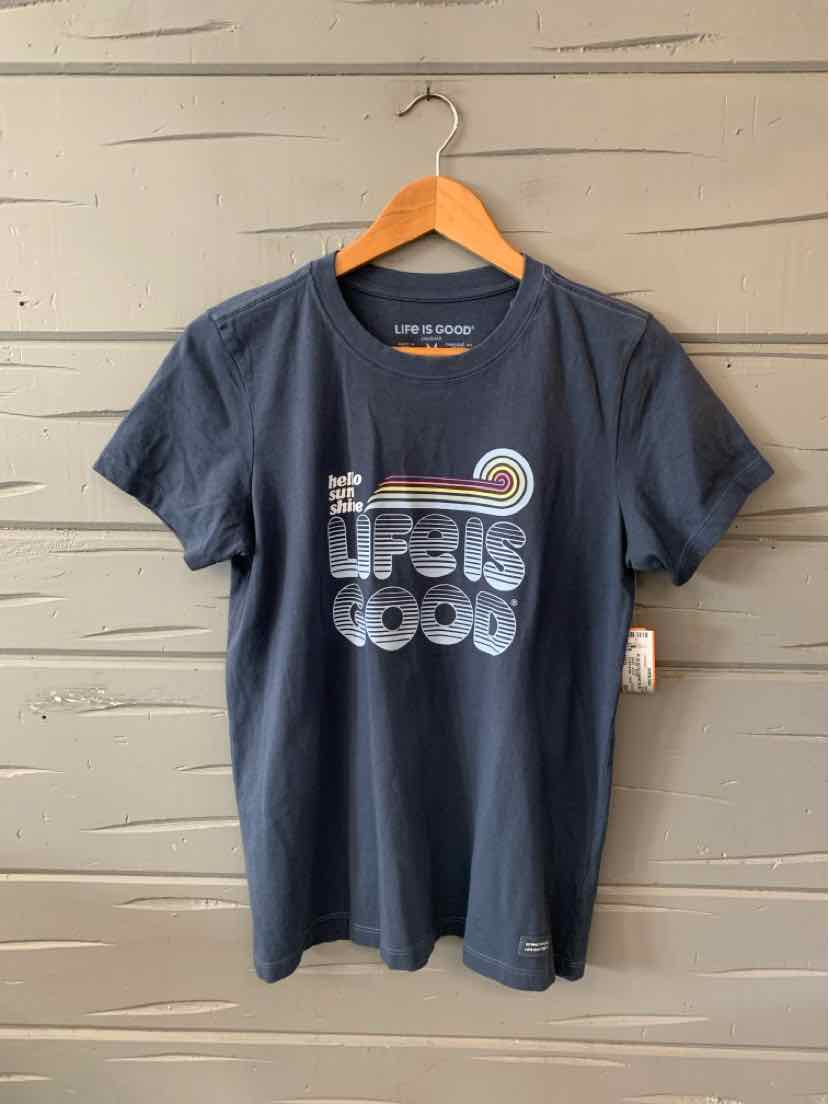 Navy blue short-sleeve cotton t-shirt with "Life is Good" graphic and retro sunset design on chest.