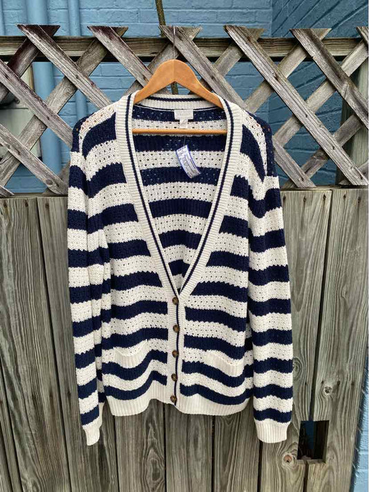 Navy and white striped knit cardigan with deep V-neck and buttons, size XL on wooden hanger.