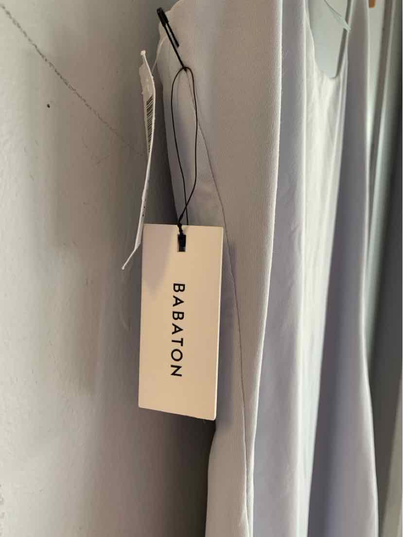 Light gray sleeveless blouse with round neckline and BABATON tag hanging from black string.