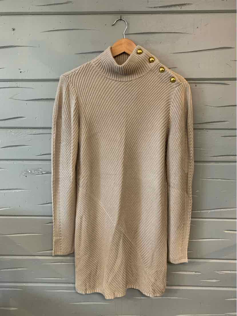 Beige knit sweater dress with long sleeves, turtleneck, and gold button details on shoulder.