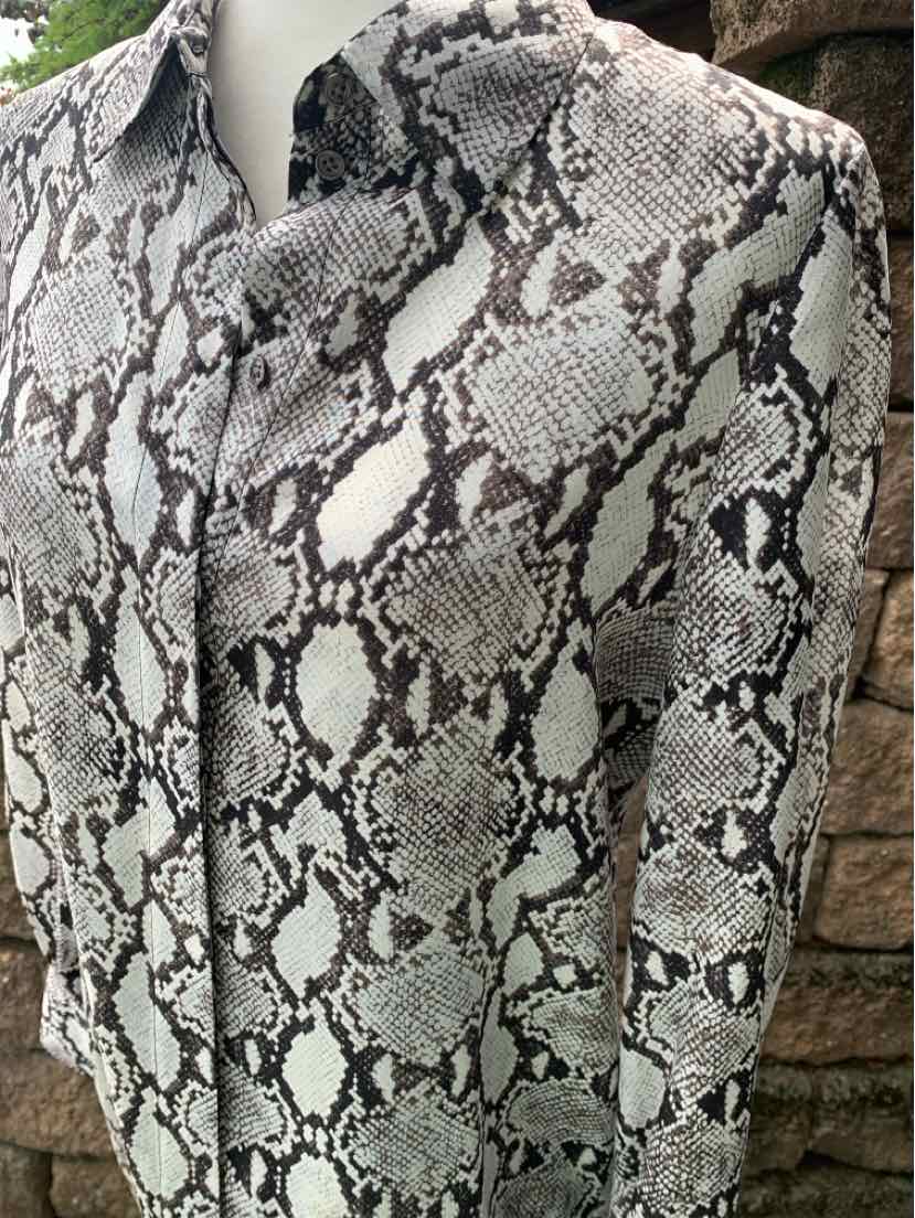 White and black snake print button-up shirt with pointed collar, size 4.