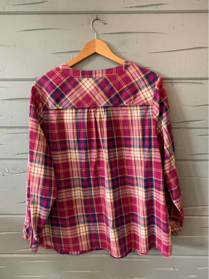 Long-sleeve plaid shirt in red, pink, and cream tones with a loose fit and gathered back yoke on wooden hanger.