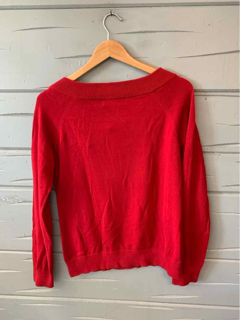Long-sleeve solid red knit sweater with a wide neckline, size large, hanging on wooden hanger.