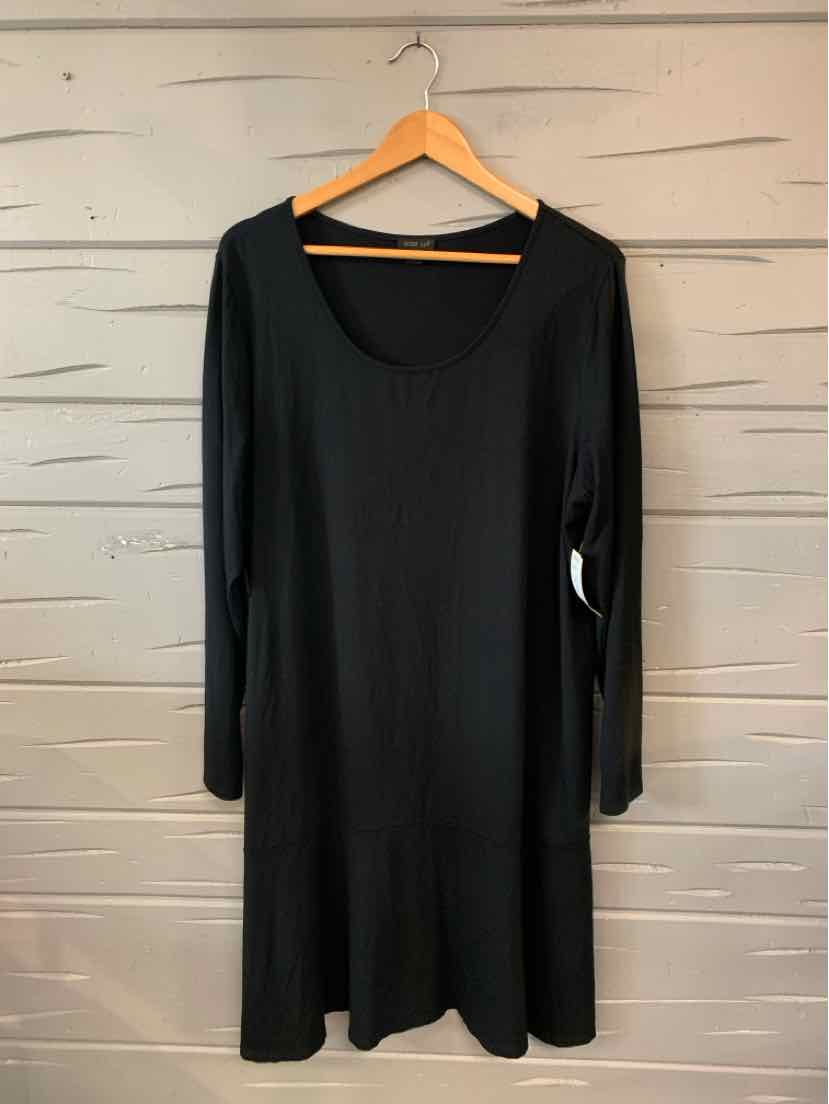 Black long-sleeve dress with scoop neckline, relaxed fit, and knee-length hem on wooden hanger.