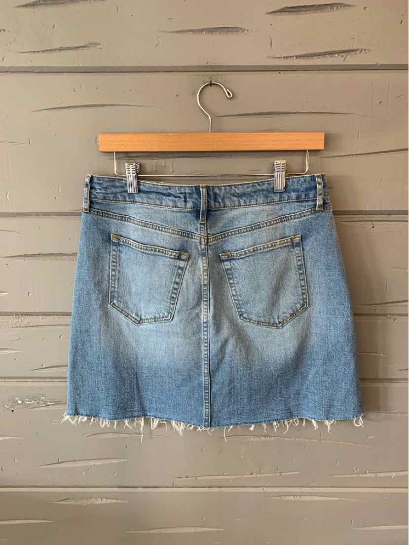 Light blue denim mini skirt with frayed hem and back pockets, size 4.