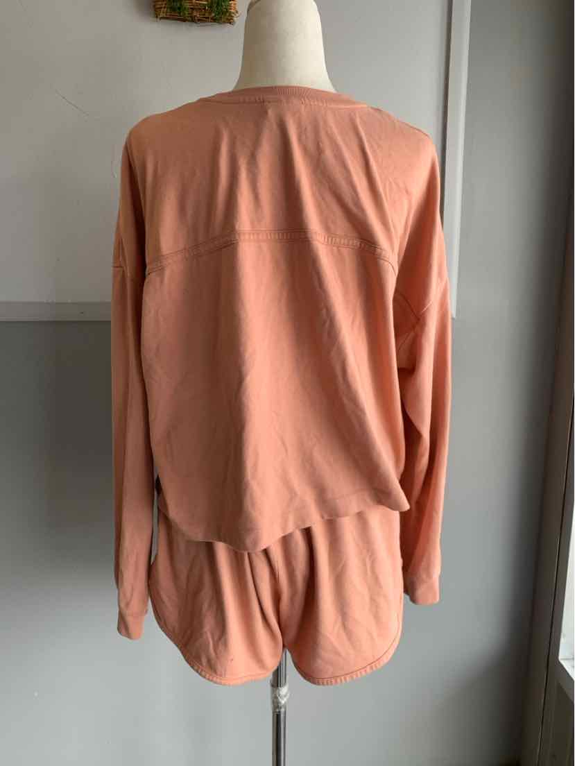 Light brown long-sleeve top with matching shorts, soft fabric, relaxed fit, casual loungewear style.
