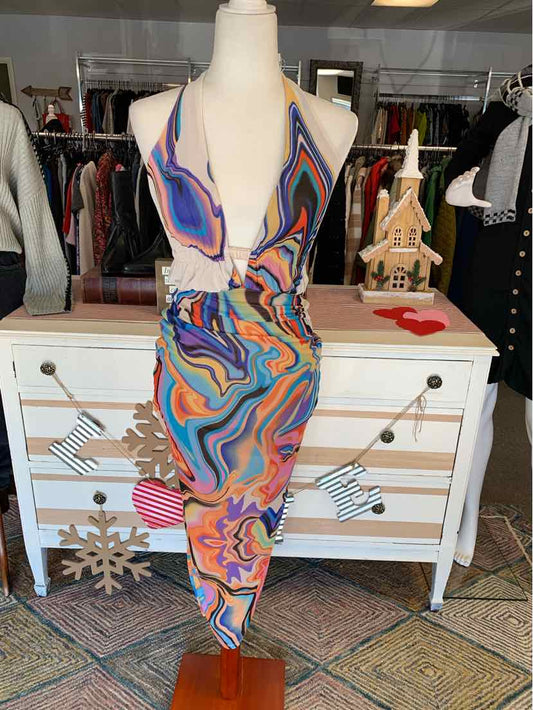 Multicolor swirl pattern sleeveless midi dress with deep V neckline and ruched detailing in size XS on mannequin.