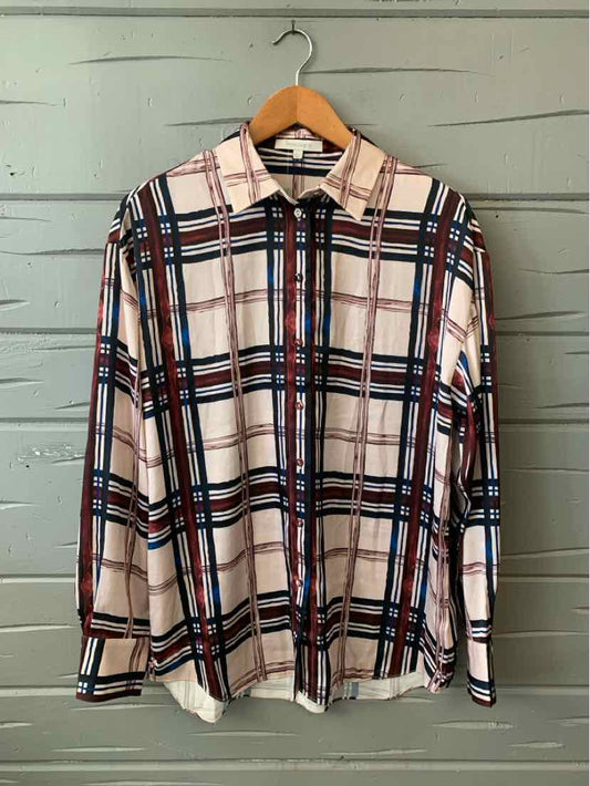Long-sleeve plaid shirt in white with navy, red, and black lines, button-up style.