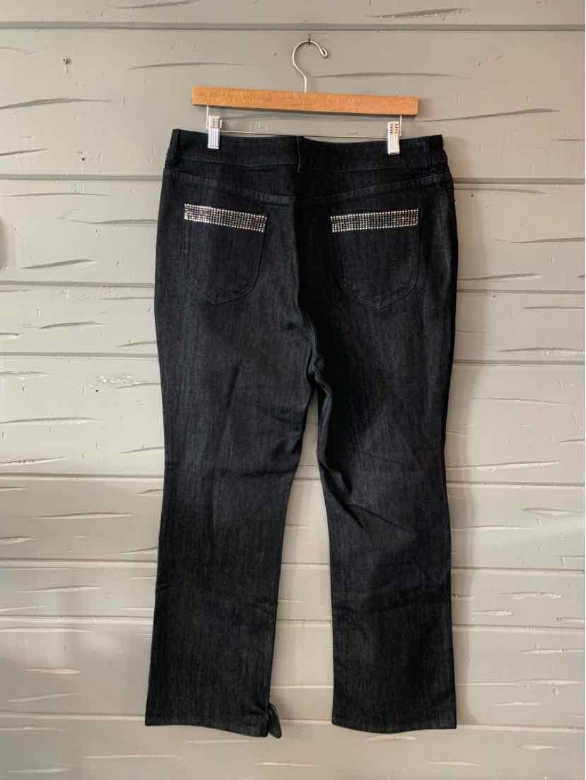 Black straight-leg pants with two back zippered pockets and a mid-rise waist.