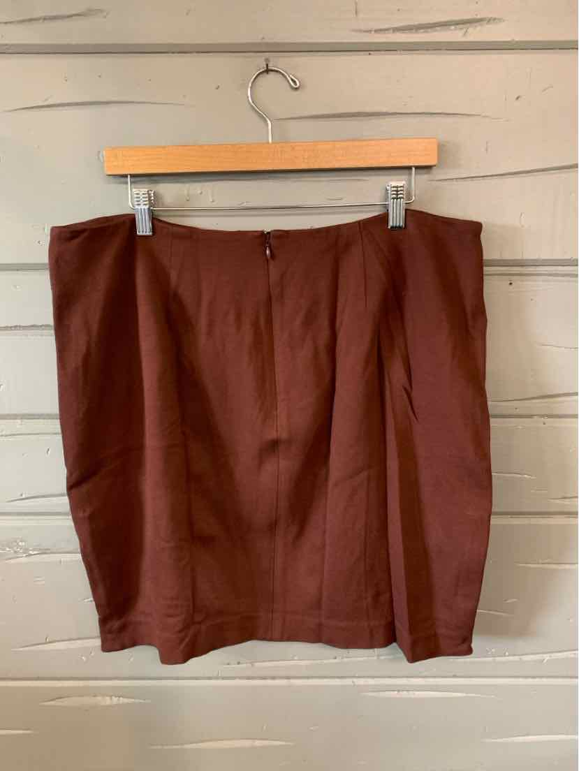 Solid burgundy knee-length skirt with front pleats and a fitted waist, size 14.