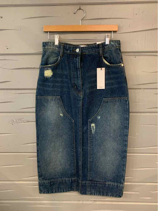 Dark blue denim skirt with distressed details and patch accents, knee-length, size 8.