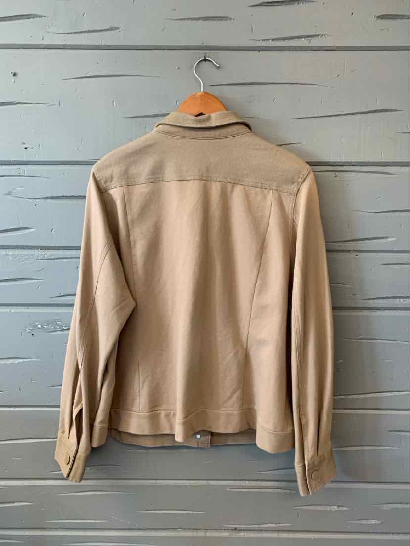 Tan lightweight jacket with long sleeves and collar hanging on wooden hanger against gray wood wall.