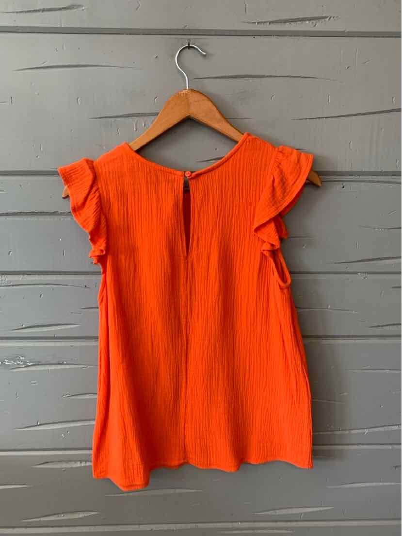 Bright orange sleeveless blouse with ruffled cap sleeves and textured fabric, shown on wooden hanger.