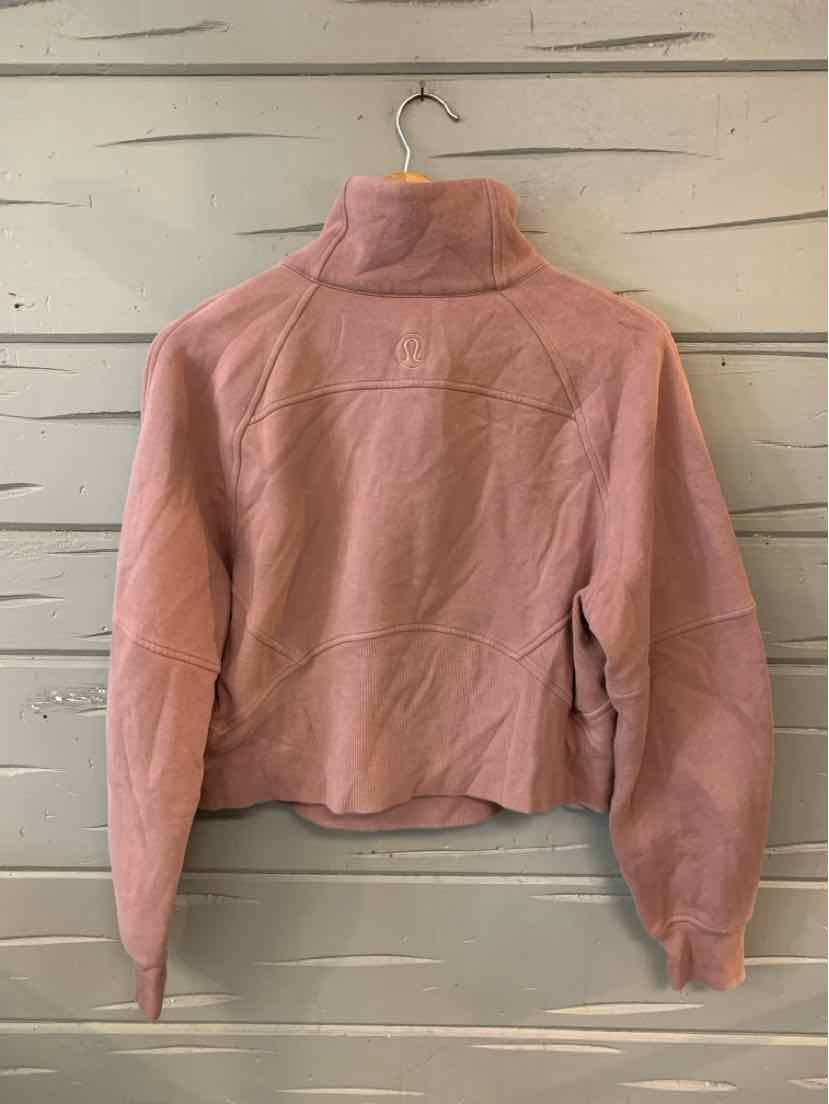 Mauve cropped fleece jacket with high collar and long sleeves, soft textured fabric, size XS/S.