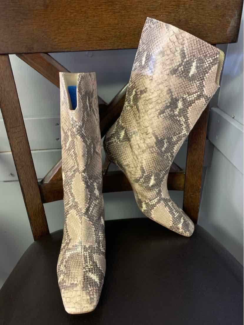 Tan mid-calf boots with snake print pattern, pointed toe, and block heel, size 9.5.