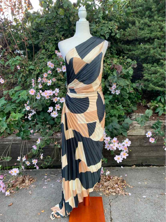 Black and tan patterned Forum maxi dress with one-shoulder neckline and flowing ruffled hem.