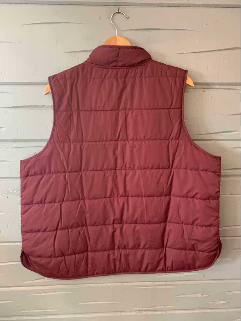 Sleeveless quilted vest in deep burgundy with a stand collar and horizontal stitching.