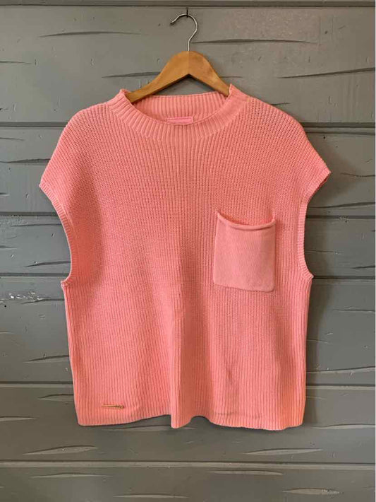 Soft pink knit sleeveless top with crew neck and front patch pocket, size large.