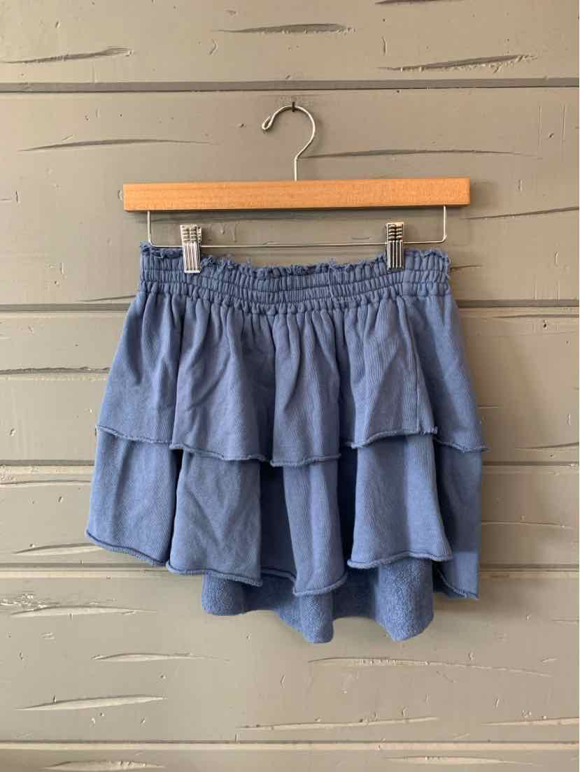 Light blue tiered mini skirt with an elastic waistband and flowy fabric layers.