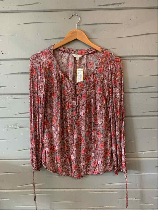 Red paisley long-sleeve blouse with V-neck and button-front, loose fit, size large.