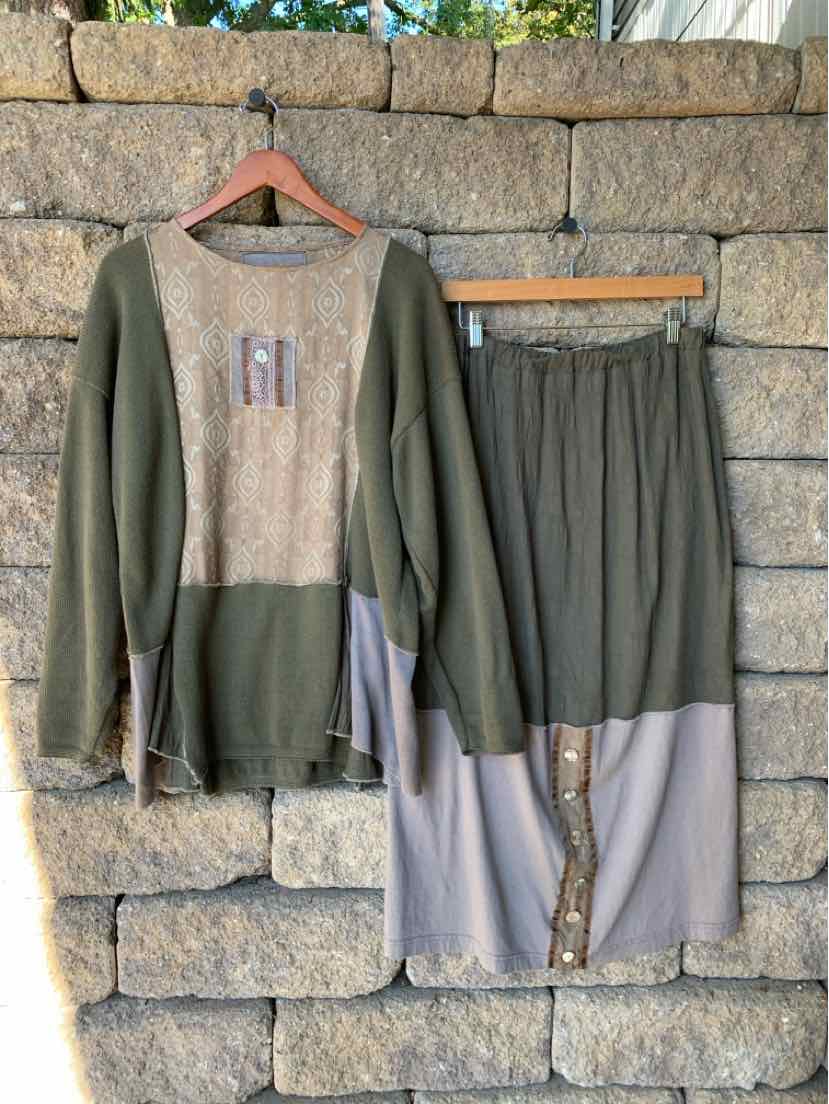 Women’s two-piece lounge set with an olive green long-sleeve top and matching elastic-waist shorts, both with gray panels.